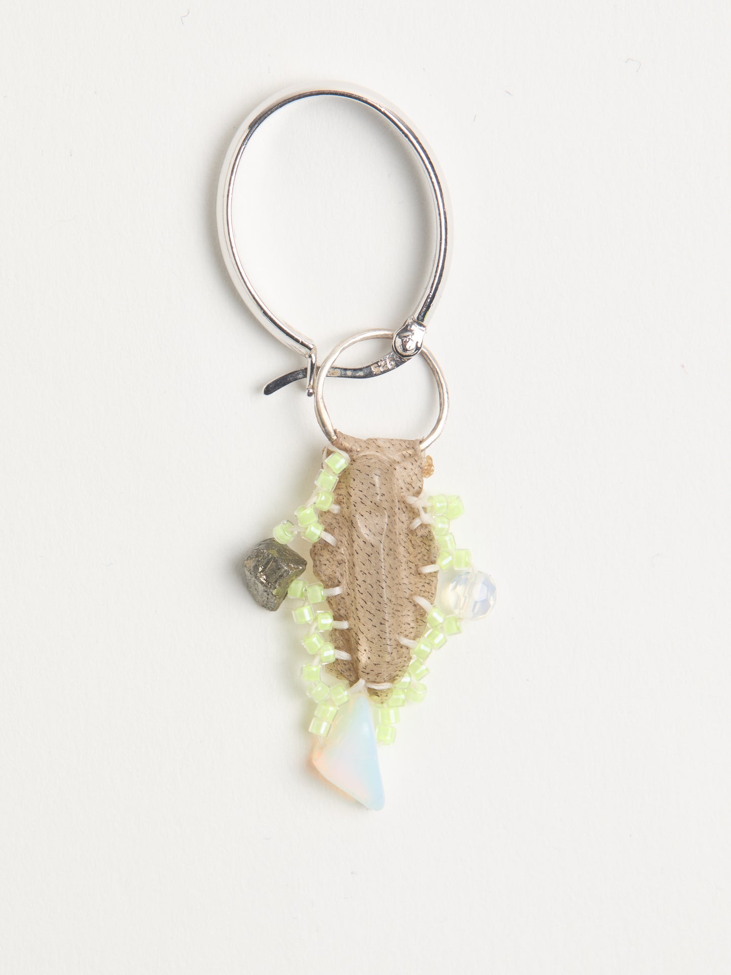 GREEN ASYMMETRICAL EARRINGS