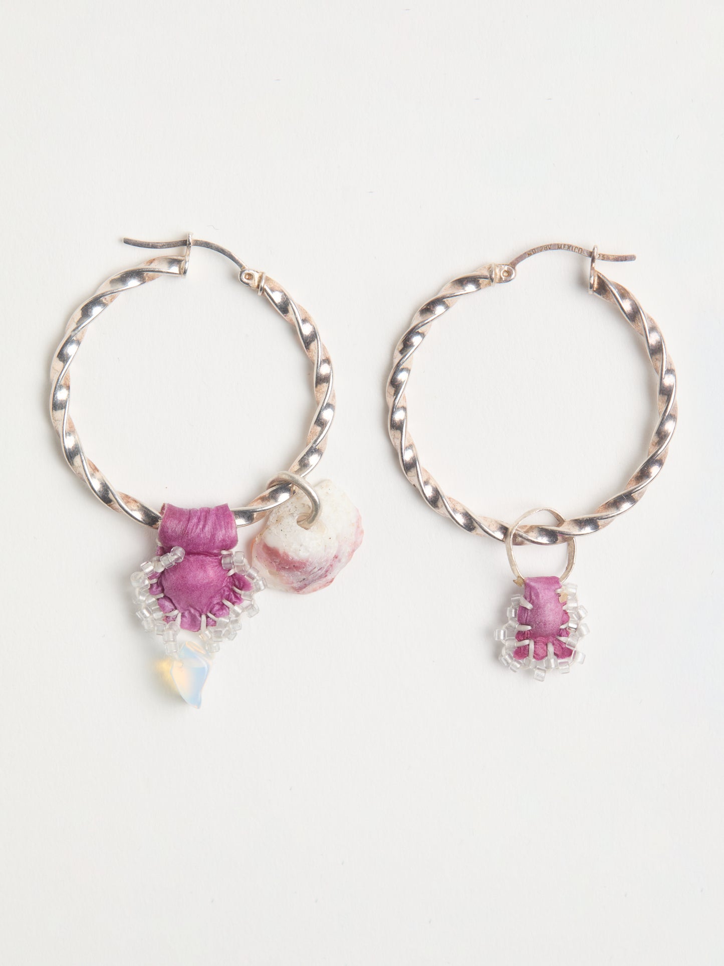 ASYMMETRICAL HOOP EARRINGS