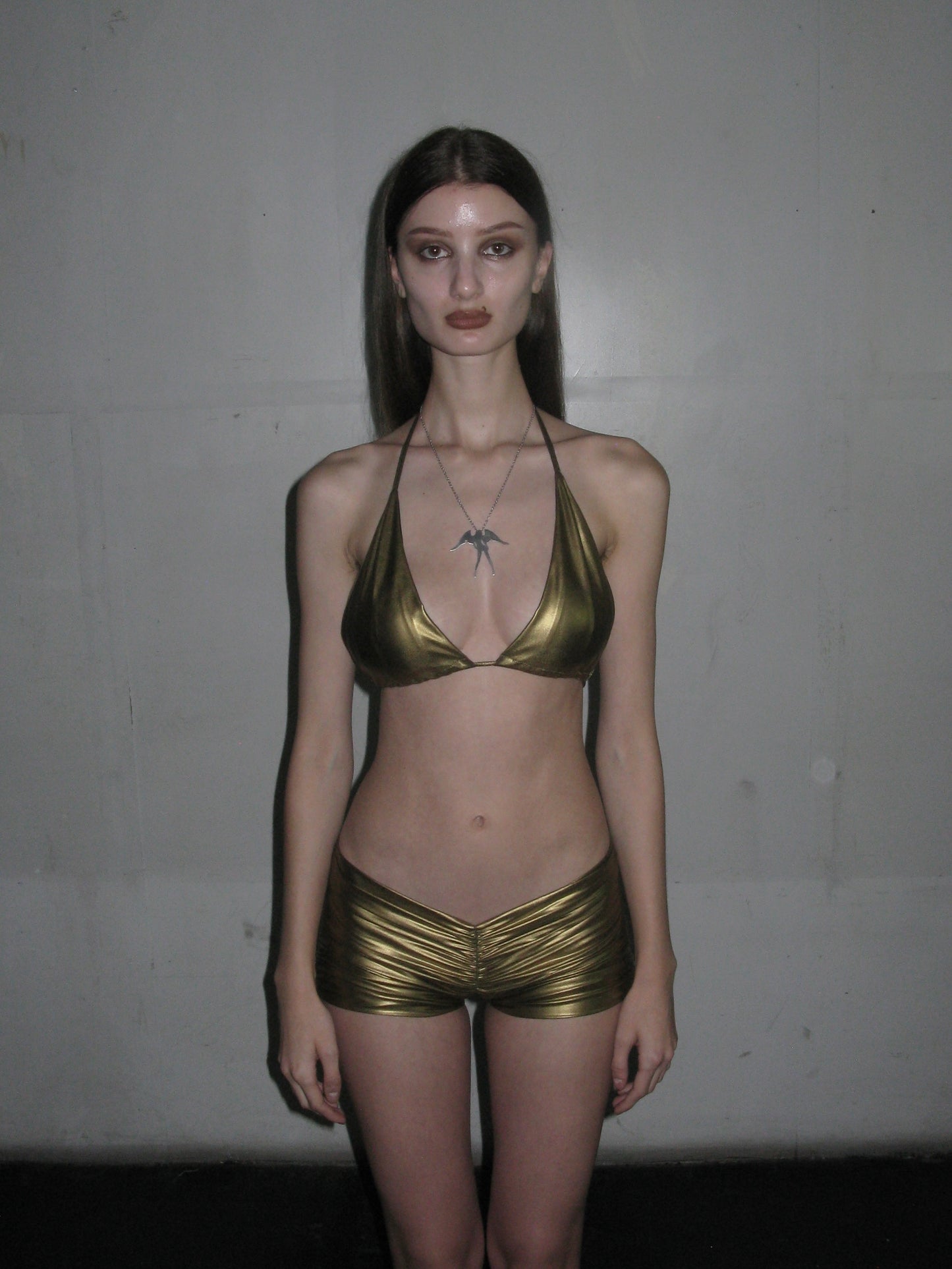 Gold mini shorts